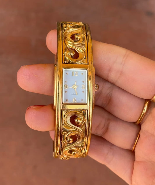 Gold cutout watch